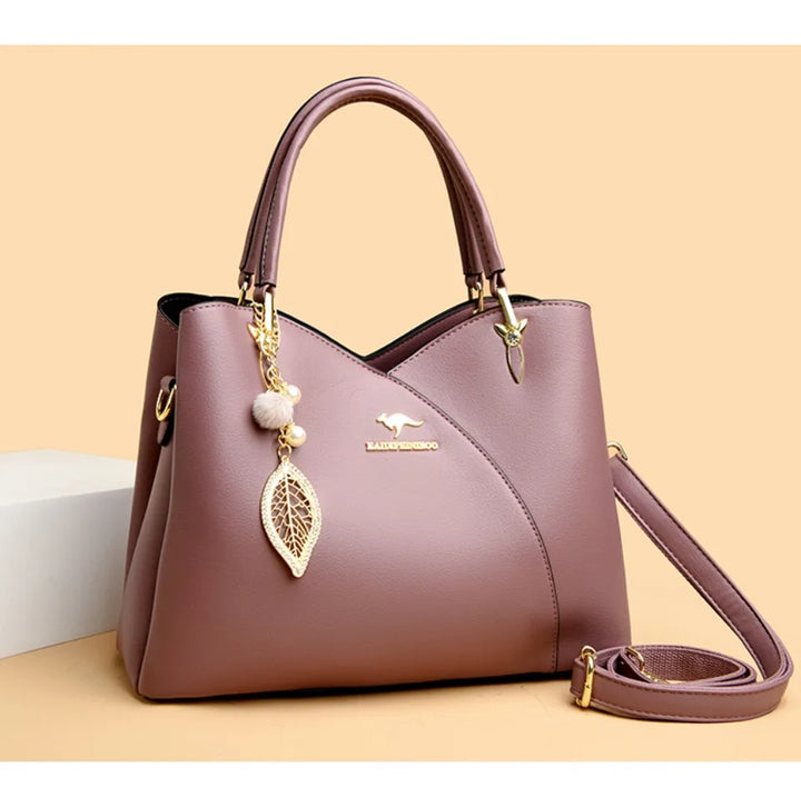 Elegant black shoulder bag with stylish charms