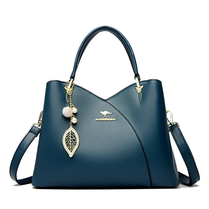 Elegant black shoulder bag with stylish charms