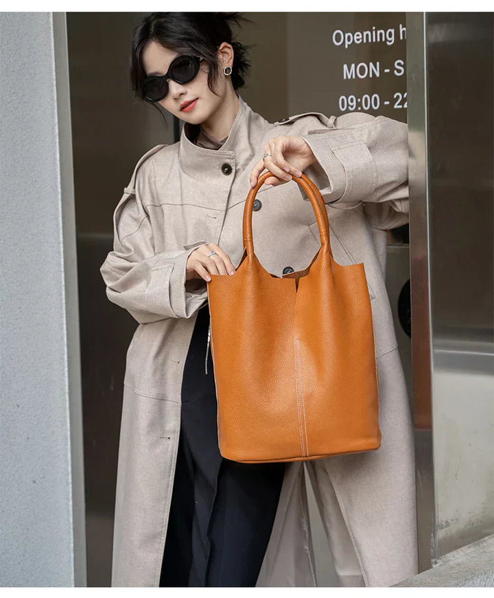 Light blue bucket bag with a luxurious leather look