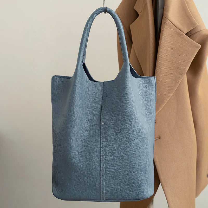 Light blue bucket bag with a luxurious leather look