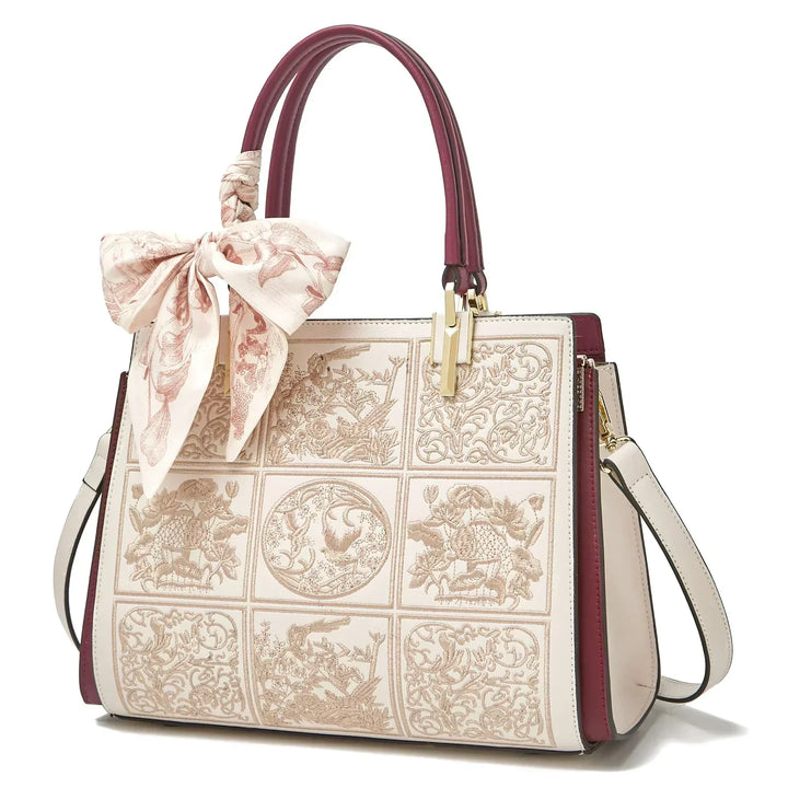 Sylvia™ – Unique crossbody bag with embroidery and bow