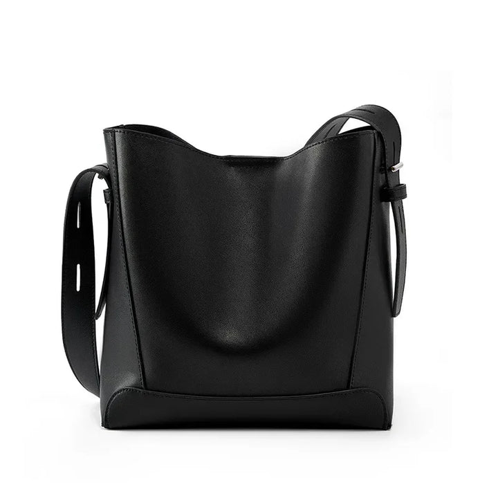 tine™ – Elegant shoulder bag in a sandy shade with strap-inspired handles