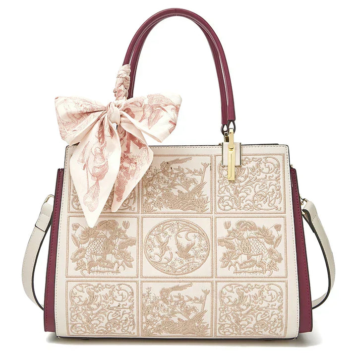 Sylvia™ – Unique crossbody bag with embroidery and bow